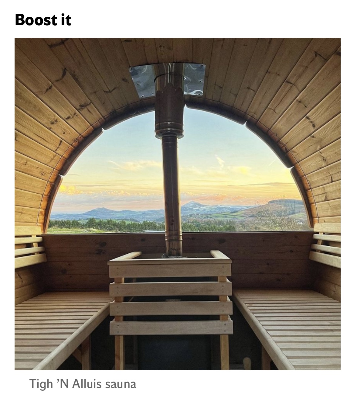 The outdoor setup combines the sauna with cold plunge tubs.